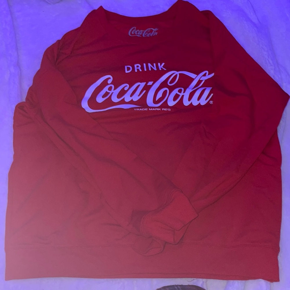 Red cocal cola sweater,long sleeve, size M, never been worn and very cute.